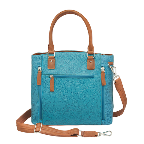 Teal and brown Town Tote concealed carry bag in tooled cowhide leather – spacious CCW compartment, durable design with adjustable shoulder strap, fits compact firearms, GTM-51