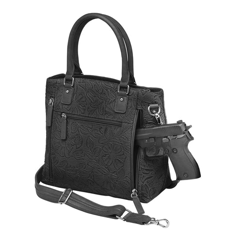 Black tooled leather concealed carry town tote crafted from USA cowhide, with discreet dual-zip gun access, reinforced slash-resistant straps, and RFID-lined interior for secure everyday carry.