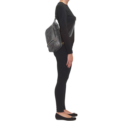 Gray sling backpack concealed carry bag with RFID protection, ambidextrous draw, and padded CCW compartment; lightweight crossbody made for quick access, featuring slash-resistant strap, fits Glock 19, Sig P365, M&P 9mm, and ideal for everyday or EDC use.