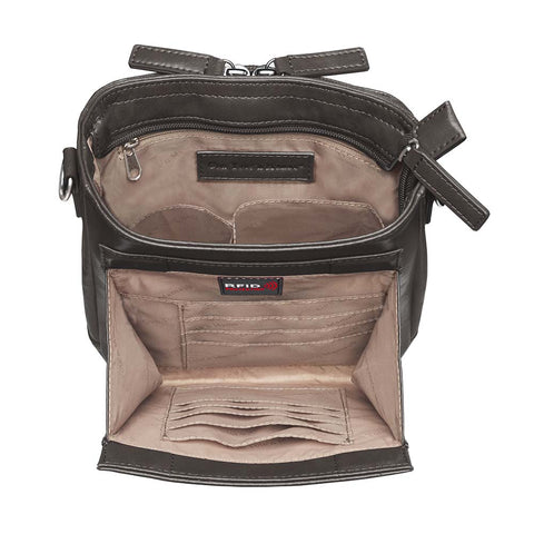 Black mini crossbody concealed carry purse for women with RFID-protected built-in wallet organizer, slash-resistant adjustable strap, zippered gun compartment for Ruger LCP, Kahr 9, and Kahr 380, washable American cowhide leather, GTM logo lining, magnetic closure, and minimalist everyday carry design.