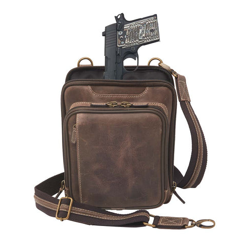 Brown Distressed full grain buffalo leather concealed carry shoulder pouch with slash-resistant crossbody strap, multi-directional draw options, and secure back zipper compartment — fits revolvers up to 1911 Commander.
