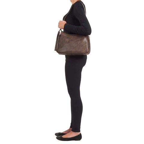 Distressed brown leather HOBO concealed carry purse with tassel draw marker, full-grain buffalo leather, dual main compartments, RFID zip pocket, padded CCW pocket fits Glock 19 or S&W Shield, slash-resistant strap, and antique brass hardware.