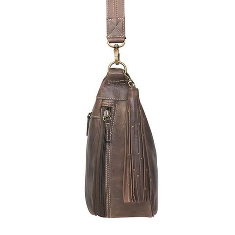 Distressed brown leather HOBO concealed carry purse with tassel draw marker, full-grain buffalo leather, dual main compartments, RFID zip pocket, padded CCW pocket fits Glock 19 or S&W Shield, slash-resistant strap, and antique brass hardware.