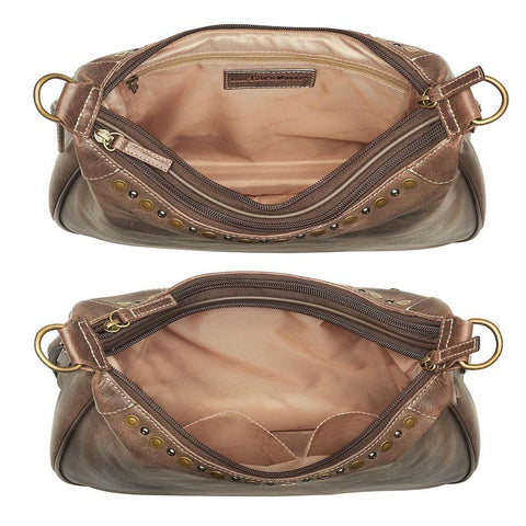 Distressed brown leather HOBO concealed carry purse with tassel draw marker, full-grain buffalo leather, dual main compartments, RFID zip pocket, padded CCW pocket fits Glock 19 or S&W Shield, slash-resistant strap, and antique brass hardware.