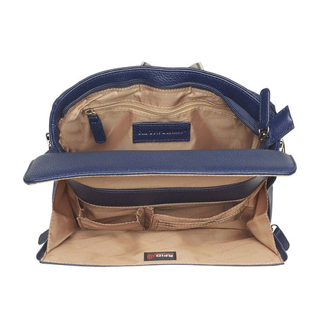 Indigo blue clutch-style concealed carry purse in soft American cowhide with RFID-protected front organizer, adjustable crossbody slash-resistant strap, triple-zip gun access for Glock 27, Ruger LCP, S&W Shield, and more. Lightweight, padded, stylish, and discreet everyday carry solution for women.