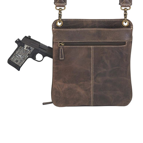 Crossbody Flat Sac Concealed Carry Purse — Rugged Brown Vintage Leather

Rock that classic vintage vibe with this distressed full grain buffalo leather crossbody purse. The rich brown leather ages like fine wine — softening and gaining character with every wear and tear. Built tough and lightweight, it’s made for both left and right-handed carriers who need stealth and speed.