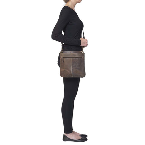 Crossbody Flat Sac Concealed Carry Purse — Rugged Brown Vintage Leather

Rock that classic vintage vibe with this distressed full grain buffalo leather crossbody purse. The rich brown leather ages like fine wine — softening and gaining character with every wear and tear. Built tough and lightweight, it’s made for both left and right-handed carriers who need stealth and speed.