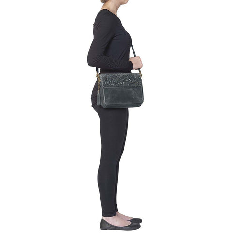Sleek, stealthy, and practical — this distressed gray leather clutch blends vintage style with tactical function. Made from full-grain buffalo leather, it grows softer and more personal with every use. Equipped for right or left-handed carry, featuring protective padding and a slash-proof shoulder strap reinforced with steel wire.