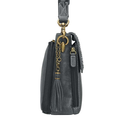 Sleek, stealthy, and practical — this distressed gray leather clutch blends vintage style with tactical function. Made from full-grain buffalo leather, it grows softer and more personal with every use. Equipped for right or left-handed carry, featuring protective padding and a slash-proof shoulder strap reinforced with steel wire.