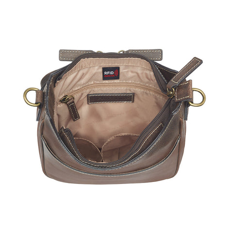 Distressed brown buffalo leather crossbody mail pouch with vintage patina, RFID protection, slash-resistant strap, and concealed carry holster compatible with left or right draw